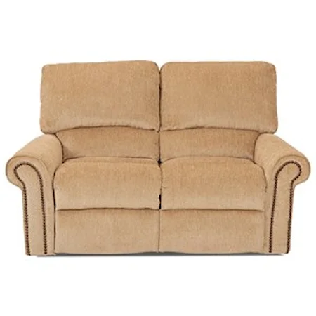 Reclining Loveseat with Rolled Arms and Nailheads 